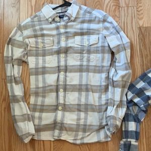 Two men’s small flannel over shirts